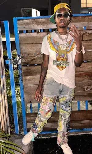 Lil Tjay wearing Louis Vuitton eyewear
