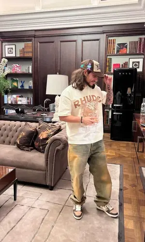 Russ’ Outfit in Rhude T-Shirt, Maison Margiela Jeans & Bape Sneakers (2023)
