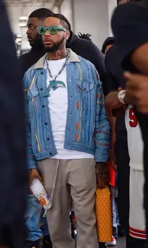 Key Glock wearing Goyard bag