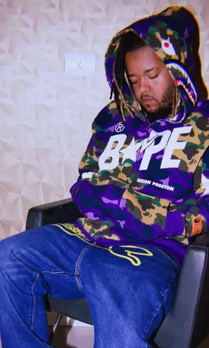Vulgo FK wearing Bape hoody