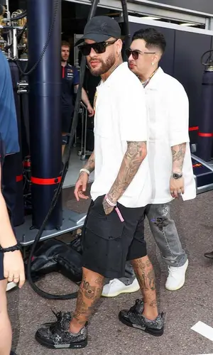 Neymar wearing Louis Vuitton shirt