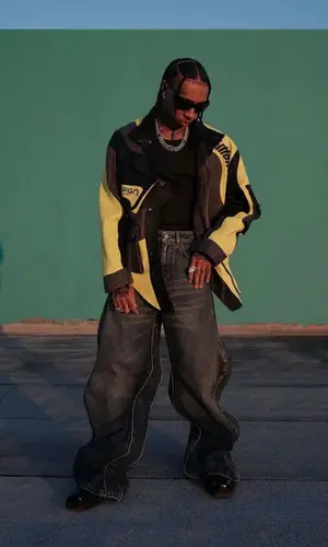 Tyga wearing Louis Vuitton jeans