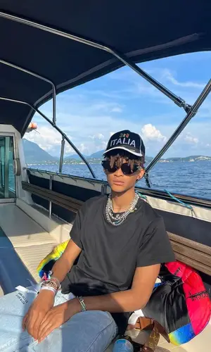 Jaden Smith’s Outfit in MSFTSrep Jeans, Louis Vuitton Eyewear & Vintage Cap (2023)