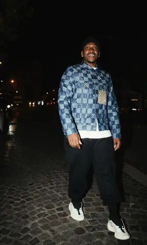 Pusha T’s Outfit in Louis Vuitton Jacket, Balenciaga Pants & Pharrell Williams Merch (2023)