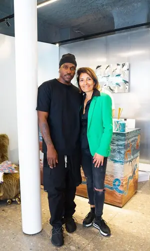 Pusha T wearing Adidas sneakers