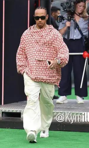 Lewis Hamilton wearing Our Legacy trousers