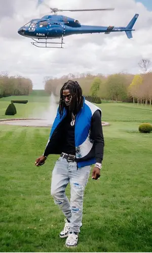 Gazo’s Outfit in Louis Vuitton Jacket, Amiri Jeans & B.B. Simon Belt (2023)