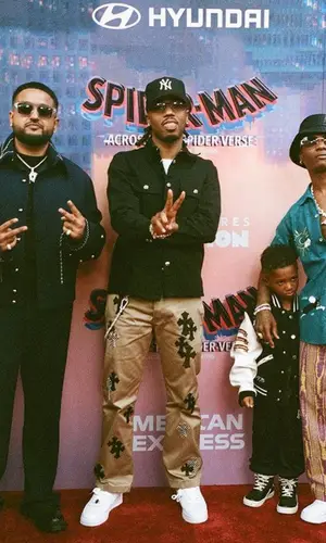 Wizkid’s Outfit in Andersson Bell Shirt, Nike Sneakers & Bottega Veneta Hat (2023)