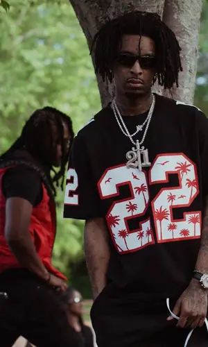 21 Savage wearing Amiri t-shirt