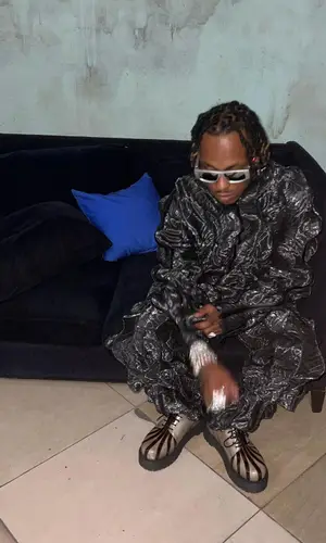 Rich The Kid wearing Mokoo shirt