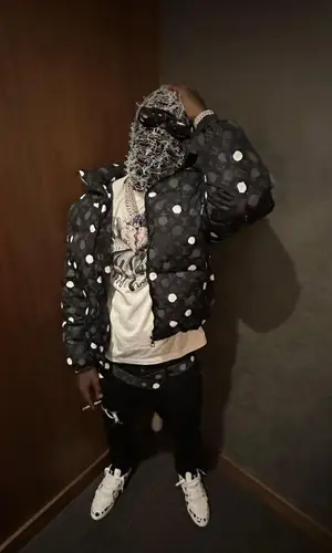 Sleepy Hallow wearing Louis Vuitton jacket