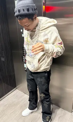 Lil Meech wearing Saint Michael hoody