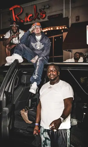 Millyz wearing Saint Michael pants