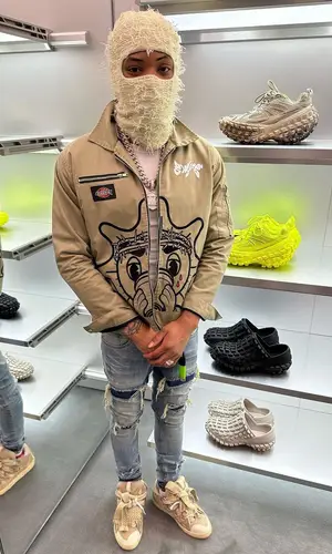 Lil Migo wearing Lanvin sneakers