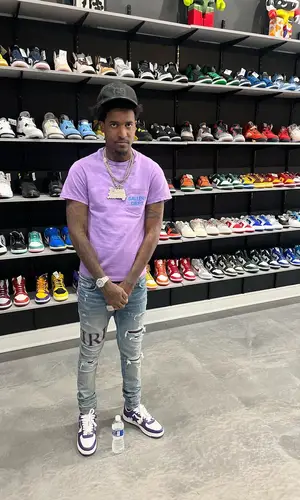 Lil Reese wearing Gallery Dept. t-shirt