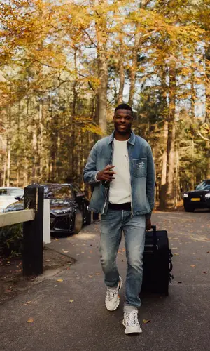 Denzel Dumfries wearing Balenciaga sneakers