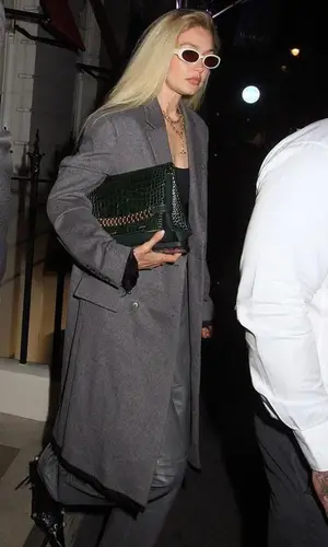 Gigi Hadid’s Outfit in Miu Miu Jacket, Dmy By Dmy Eyewear & Balenciaga Sandals (2023)