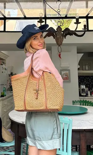 Chiara Ferragni’s Outfit in Zara Shorts, Tod's Bag & Miu Miu Hat (2023)