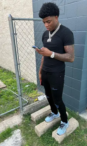 Yungeen Ace wearing Amiri jeans
