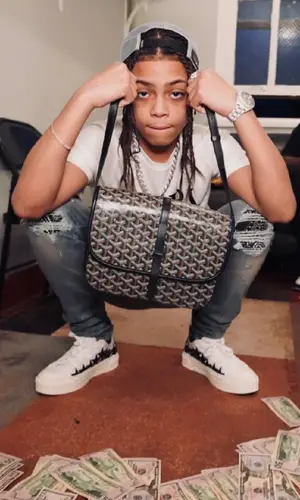 SugarHill Ddot wearing Amiri t-shirt