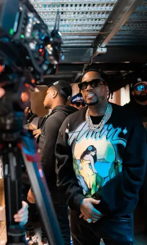 Fivio Foreign wearing Amiri sweatshirt