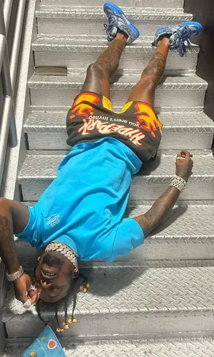 Sauce Walka wearing Louis Vuitton hat