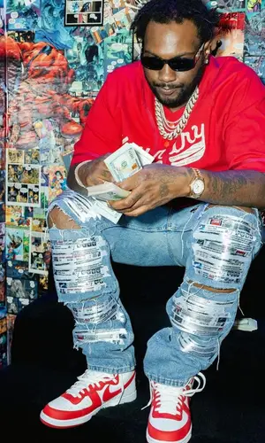Peezy wearing Kapital jersey