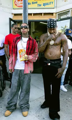 Tyga wearing Vetements shirt