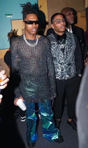 Lil Baby wearing Maison Margiela sweater