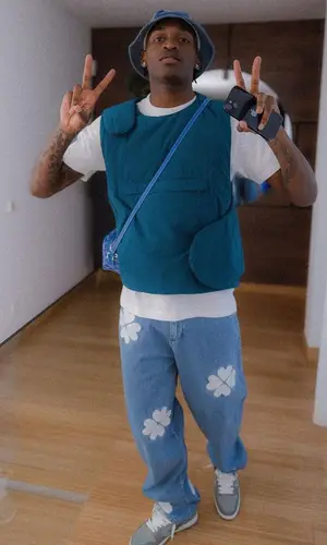 Rafael Leao wearing Goyard bag