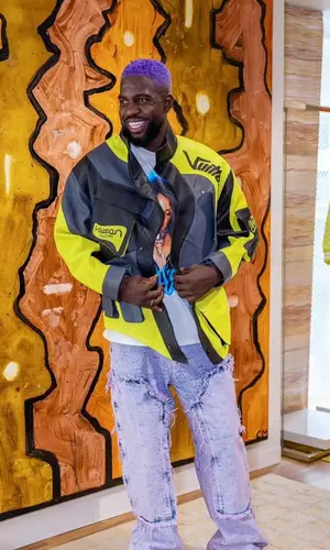 Samuel Umtiti wearing Louis Vuitton jacket