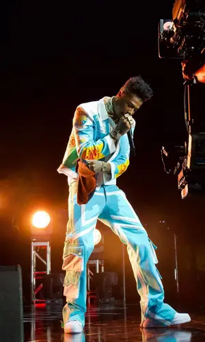 Blueface’s Outfit in Ian Alexander Jacket & Nike Sneakers (2023)