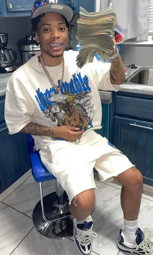 Lil Migo wearing Luv Abominable sweatshirt