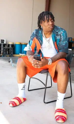Fredo Bang wearing Marni shorts