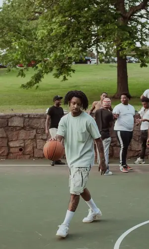 21 Savage wearing Louis Vuitton t-shirt