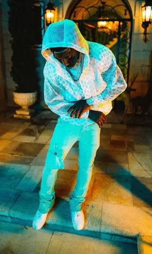 2Rare wearing Louis Vuitton jacket
