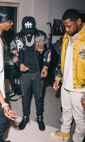 A Boogie Wit Da Hoodie wearing Supreme pants