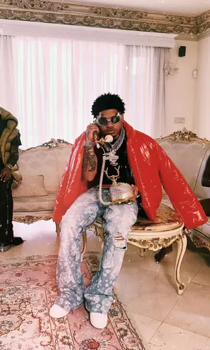 No Cap wearing Yeezy jacket