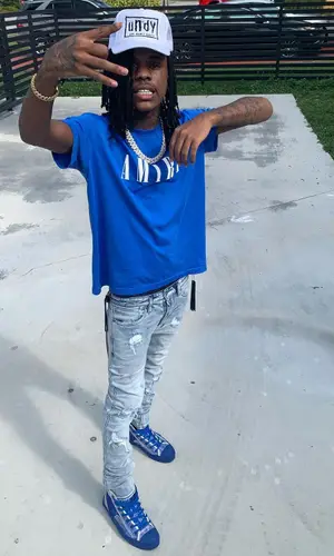 Slatt Zy wearing Ksubi jeans