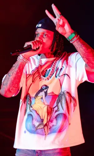Lil Durk wearing New Era cap