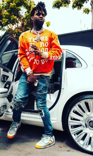 Chief Keef wearing Saint Michael sweater
