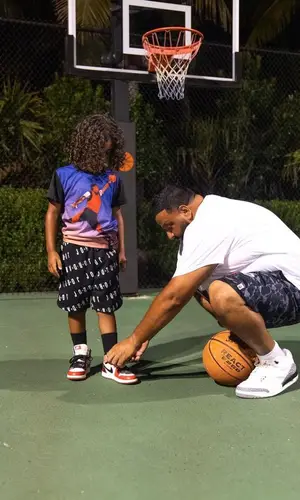 DJ Khaled wearing Polo Ralph Lauren t-shirt