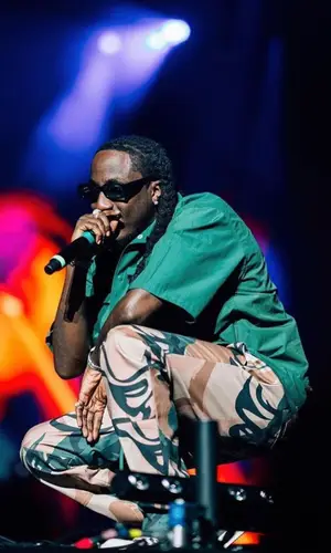 K Camp wearing Tier jacket