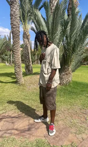 Eduardo Camavinga’s Outfit in Jacquemus T-Shirt, Rick Owens Shorts & Travis Scott Merch Sneakers (2023)
