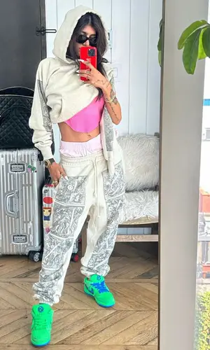 Mia Khalifa’s Outfit in Denim Tears Pants, Nike Sneakers & Saint Michael (2023)