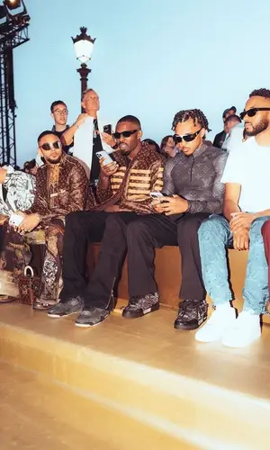 Marcus Thuram wearing Louis Vuitton jacket