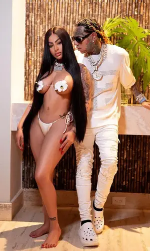 6ix9ine’s Outfit in Amiri T-Shirt, Off-White Eyewear & Crocs Sandals (2023)