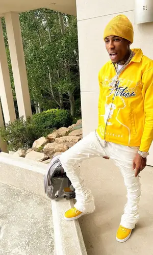 NBA YoungBoy wearing Honey Fucking Dijon belt