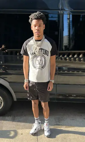 Nardo Wick wearing Alexander McQueen sock