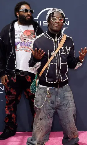 ASAP Bari’s Outfit in Vintage T-Shirt, Vlone Hoodie & Louis Vuitton Sneakers (2023)